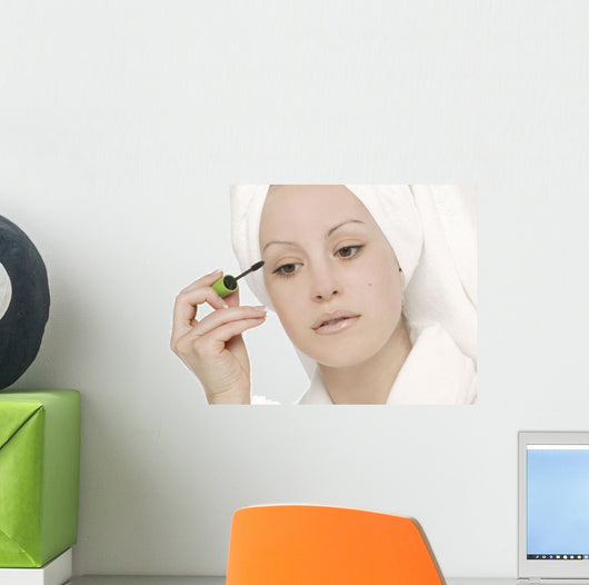 Woman Applying Mascara Wall Mural