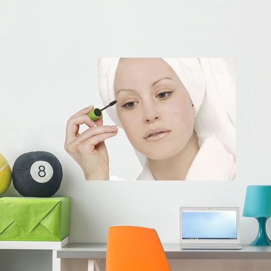 Woman Applying Mascara Wall Mural