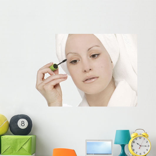 Woman Applying Mascara Wall Mural