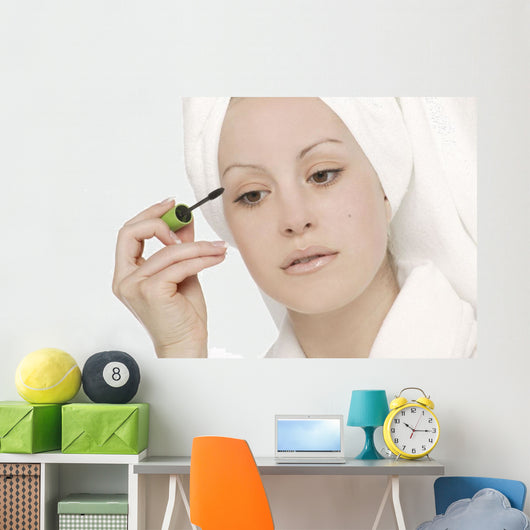 Woman Applying Mascara Wall Mural
