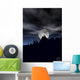 Wolf howling in moonlight silhoutte Wall Mural