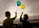 Two Children With Balloons Wall Mural