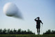 Golf Ball In Flight Wall Mural