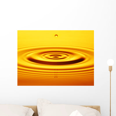 Split Second Drop Gold Wall Mural shown on a wall