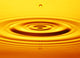 Split Second Drop Of Gold Liquid Wall Mural