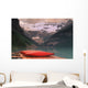 Canoes Lined On A Dock Wall Mural