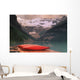 Canoes Lined On A Dock Wall Mural