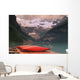 Canoes Lined On A Dock Wall Mural