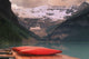 Canoes Lined On A Dock Wall Mural