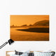 A Body Of Water At Sunset Wall Mural