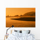 A Body Of Water At Sunset Wall Mural