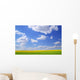 Scenic View Of Meadow And Canola Crop Wall Mural