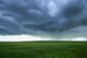 A Cloudy Sky Over A Field, Alberta, Canada Wall Mural