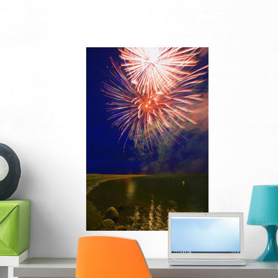 Fireworks Night Sky Wall Mural shown on a wall