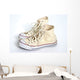 A Pair Of Cream Hightop Sneakers Wall Mural
