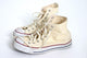 A Pair Of Cream Hightop Sneakers Wall Mural