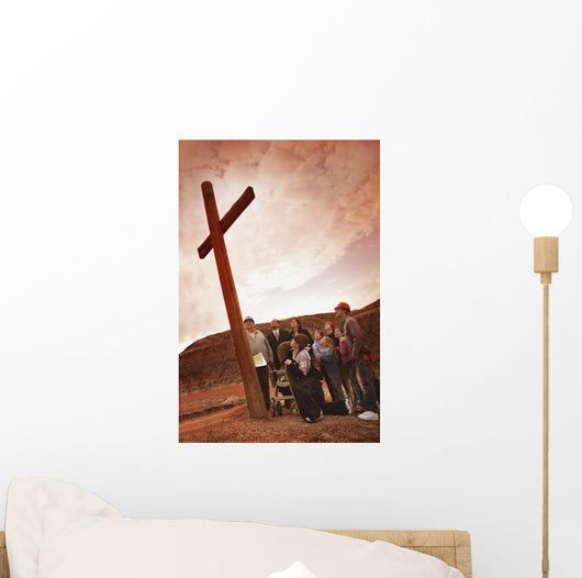 A Small Crowd Gathered At A Wooden Cross Wall Mural