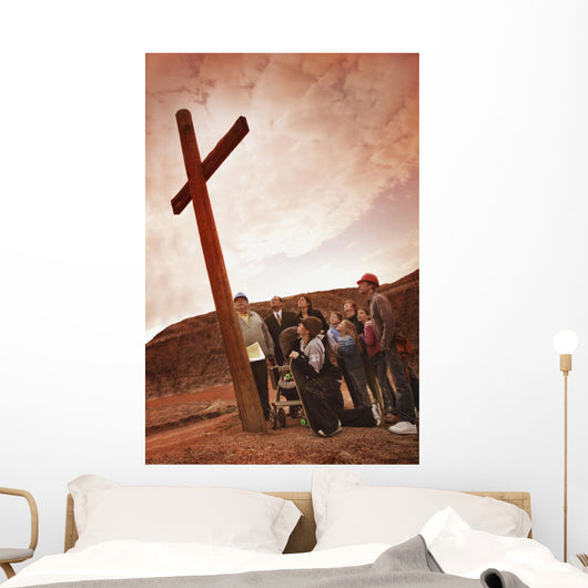 A Small Crowd Gathered At A Wooden Cross Wall Mural