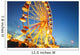 A Ferris Wheel At Night Wall Mural
