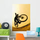 Silhouette Of A Cyclist Against A Yellow Sky Wall Mural