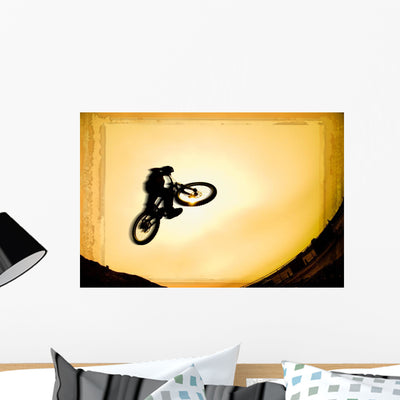 Silhouette Stunt Cyclist Wall Mural shown on a wall