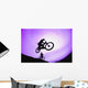 A Stunt Cyclist Silhouette Wall Mural