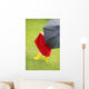 A Little Girl Walking In The Rain While Holding An Umbrella Wall Mural