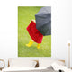 A Little Girl Walking In The Rain While Holding An Umbrella Wall Mural
