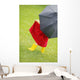 A Little Girl Walking In The Rain While Holding An Umbrella Wall Mural