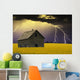 An Abandoned Farm Building With Lighting In The Background Wall Mural
