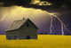 An Abandoned Farm Building With Lighting In The Background Wall Mural