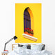 A Window In A Bright Yellow Wall Wall Mural