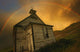Old Church With Rainbow Over Building Wall Mural