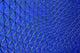 Metal Mesh Against A Blue Sky Wall Mural