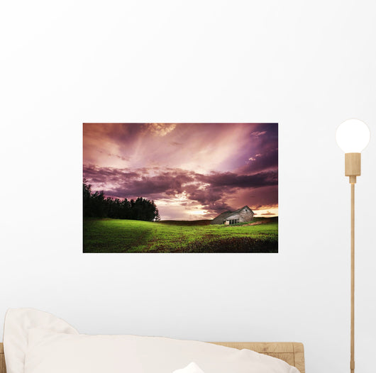 A Lonely Farm Building In An Open Field Wall Mural