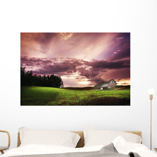 A Lonely Farm Building In An Open Field Wall Mural