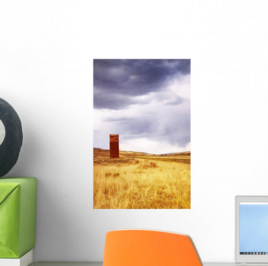 A Grain Elevator In A Field Wall Mural