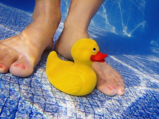 Toy At The Bottom Of A Pool Wall Mural