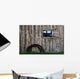 Roll Of Barbed Wire On Weathered Barn Wall Mural
