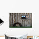 Roll Of Barbed Wire On Weathered Barn Wall Mural