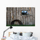 Roll Of Barbed Wire On Weathered Barn Wall Mural