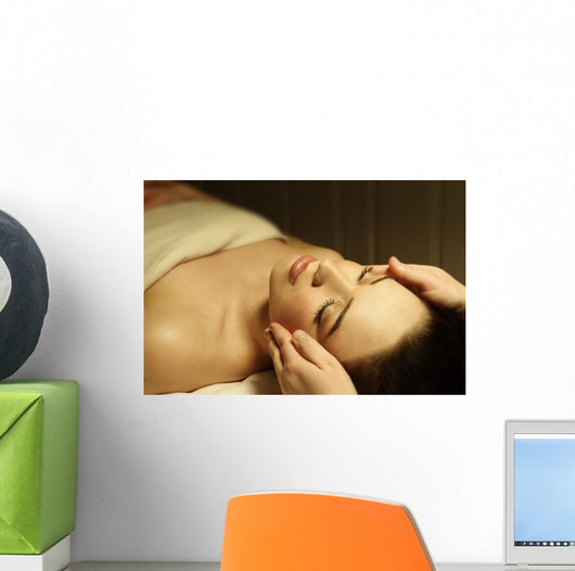 Woman Having A Facial Massage Wall Mural