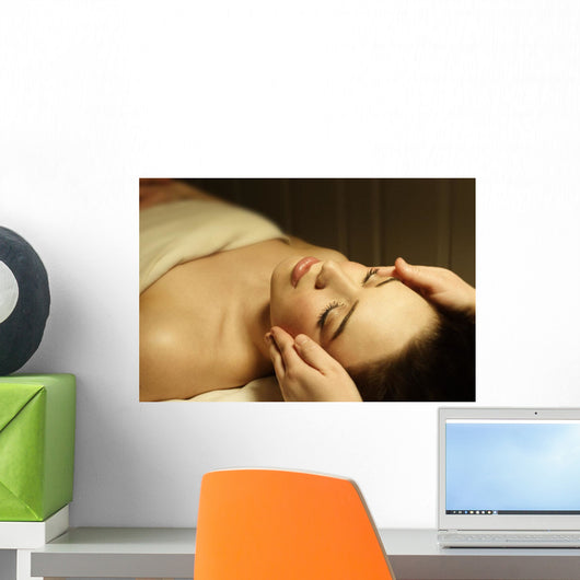 Woman Having A Facial Massage Wall Mural