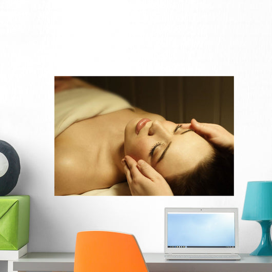 Woman Having A Facial Massage Wall Mural