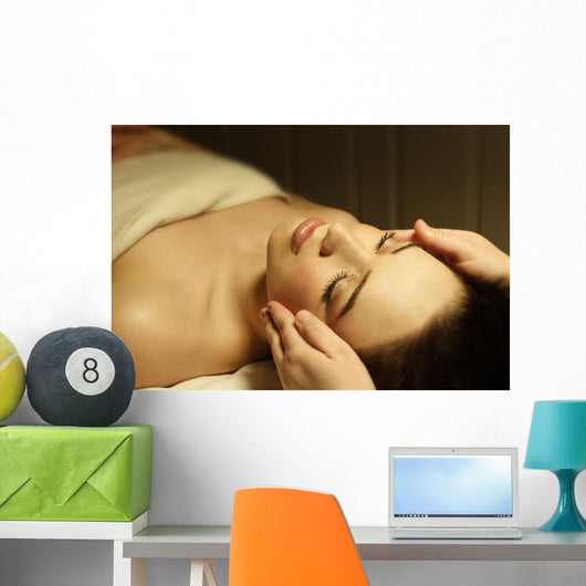 Woman Having A Facial Massage Wall Mural