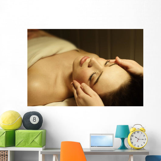 Woman Having A Facial Massage Wall Mural