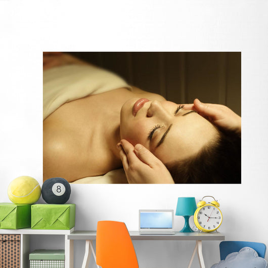 Woman Having A Facial Massage Wall Mural