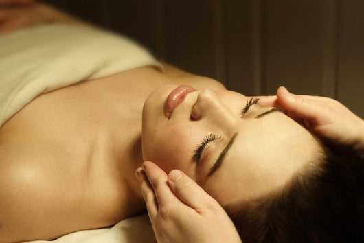 Woman Having A Facial Massage Wall Mural