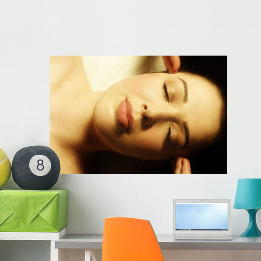 Woman Having Face Massaged Wall Mural