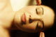 Woman Having Face Massaged Wall Mural